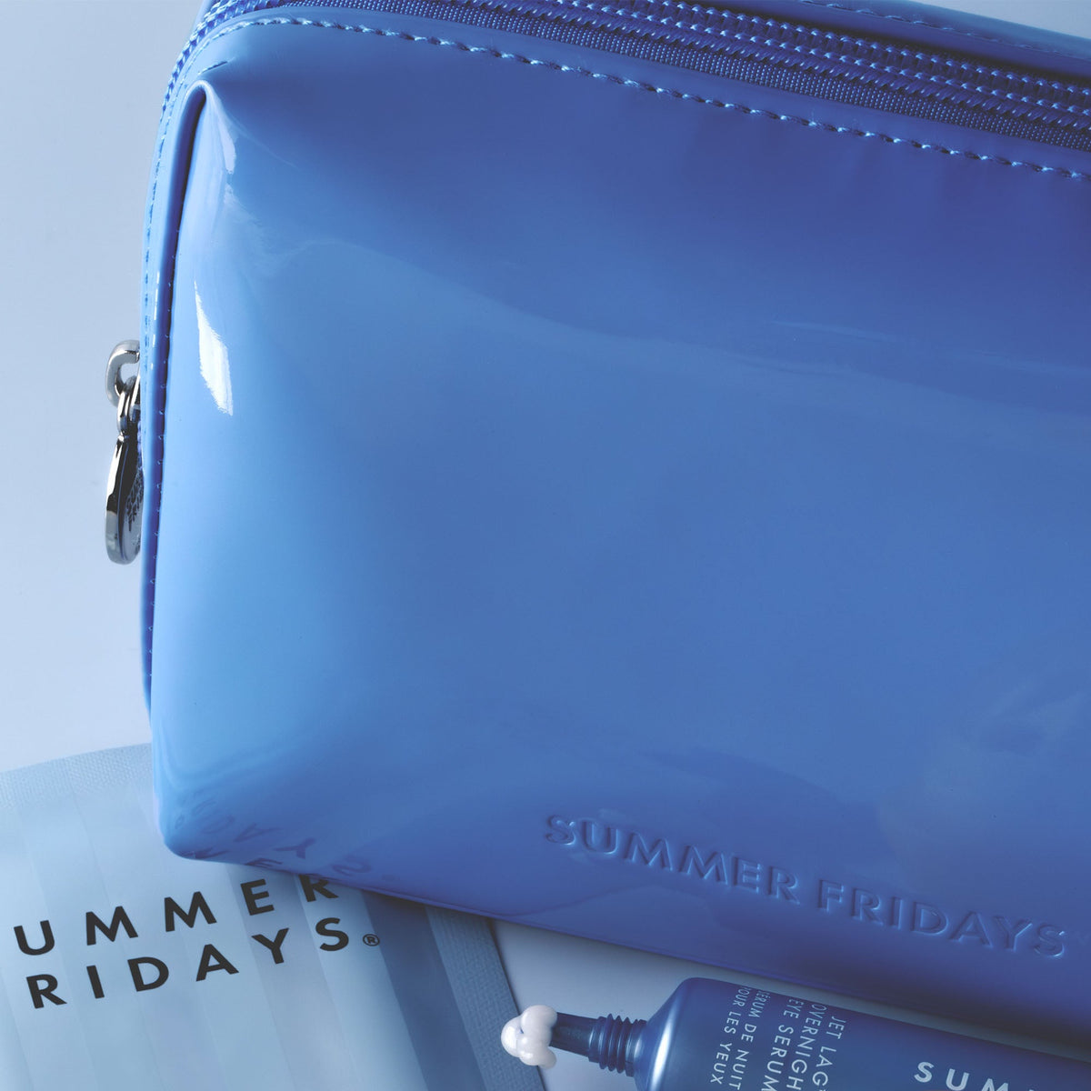 glossy-pouch-in-jet-lag-blue-o4 Glossy-Pouch-Jet-Lag.jpg